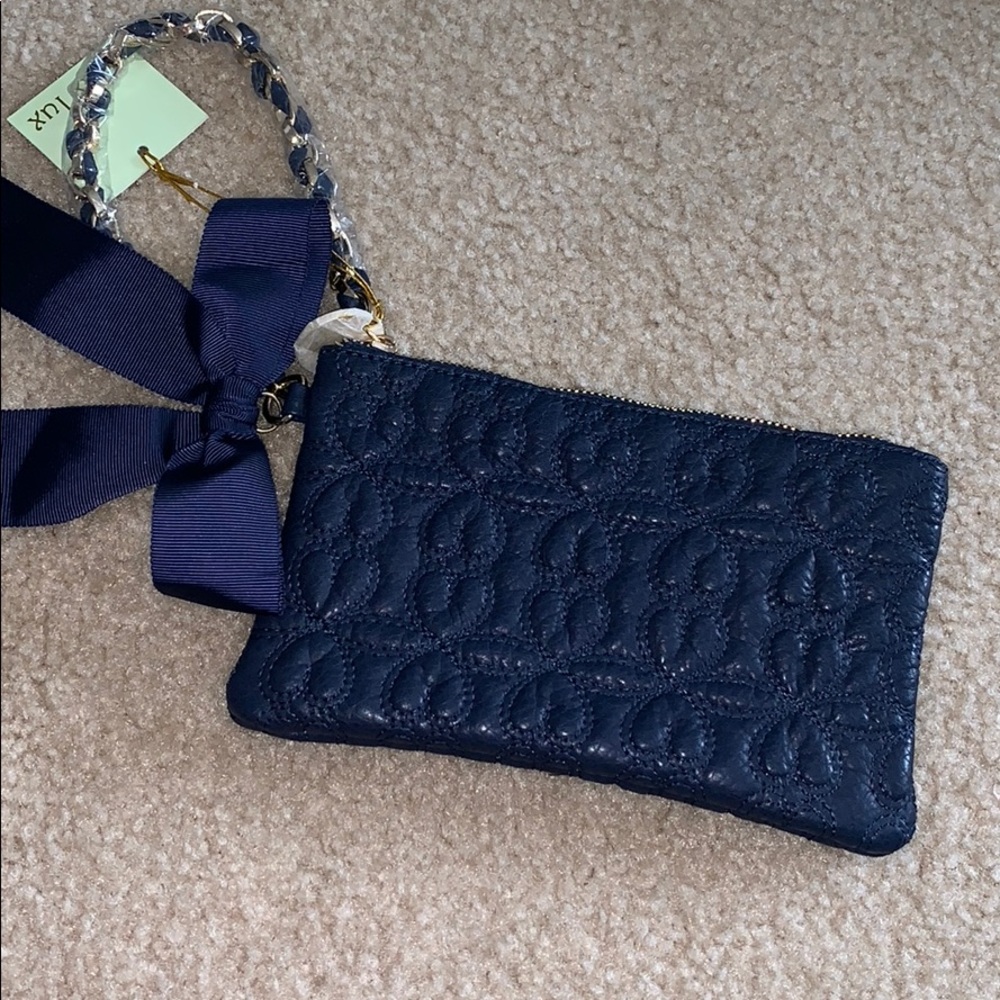 Deux Lux clutch never used.